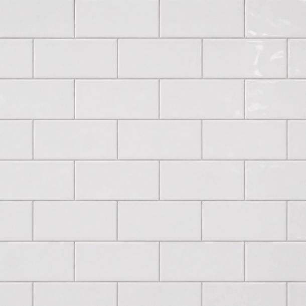 White subway tiles arranged in a horizontal brick pattern on a wall.